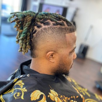 Fresh cut with styled locs